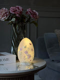 LED-lampa med blommor